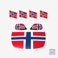Fanshoppen Norge car decoration kit with Norwegian flags on hood, roof, and side mirrors. White car with red, white, and blue flag design.