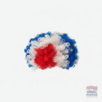 Fanshoppen Norge red, white, and blue curly wig in Norwegian flag colors.