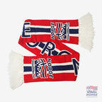 Fanshoppen Norge red, white, and blue knitted scarf with horizontal Norwegian flag design and "NORGE" text.